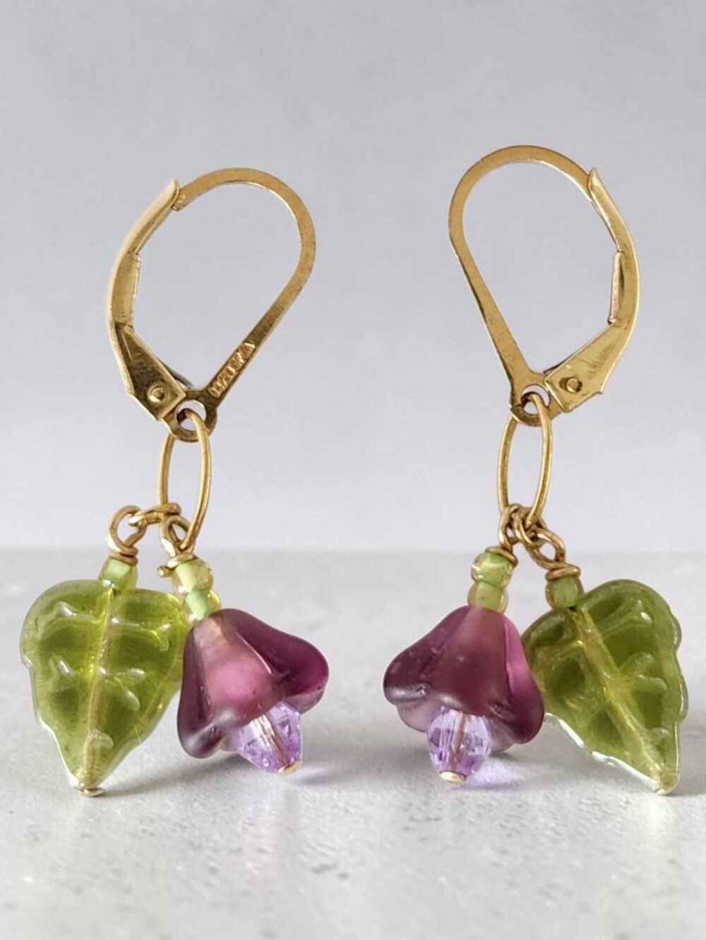 14K Gold Filled Earrings with Green Leaf and Purple Flower Dangle Glass Charms